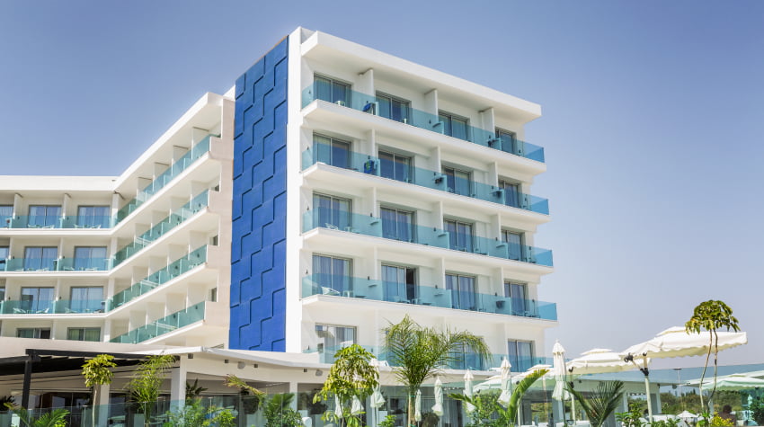 exterior-hotel-resort-with-swimming-pool-sun-loungers 2